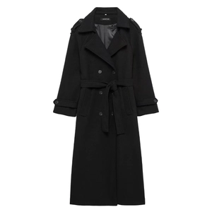 Detail view of double-breasted long black wool coat with matching belt and shoulder epaulettes