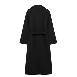 Detail view of long black wool coat featuring high-quality fabric and adjustable waist belt