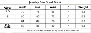 Tableau des tailles détaillé pour la robe courte avec nœud bijoux et les mensurations