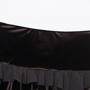 High-waisted velvet mini skirt with ruffled chiffon hem in a rich dark brown finish