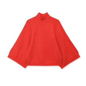 Classic red knitted sweater with loose fit and mock neck design on white background
