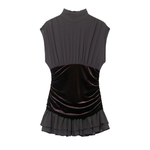 Elegant high neck sleeveless tunic featuring mesh stitching and velvet ruffled waistline