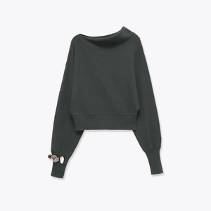 Dark green off-shoulder knit sweater with ribbed cuffs and unique sleeve metal ring detail