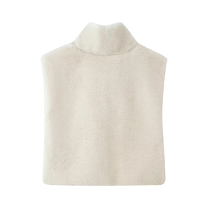 Detail of soft white faux fur high neck sleeveless vest with thick plush texture