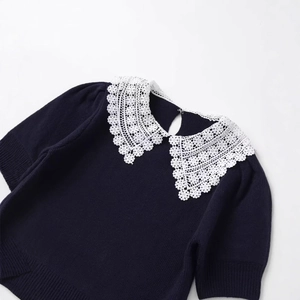 Women's navy short sleeve knit top with decorative white lace Peter Pan collar