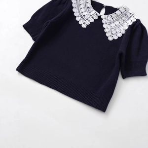 Dark blue short sleeve knit top featuring elegant white lace Peter Pan collar and puff sleeves