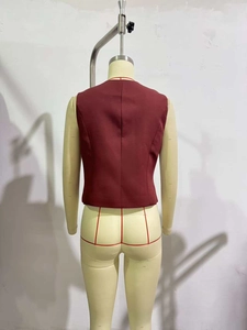 Rear view of slim fit burgundy waistcoat with tailored back seam and woven fabric