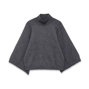 Loose dark grey turtleneck knit sweater with raglan sleeves and ribbed details