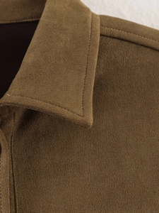 Detail of brown faux suede shirt jacket showing the collar and stitching craftsmanship