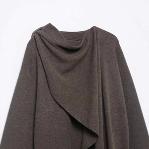 Chic dark brown knit coat featuring asymmetric draped collar and thick wool blend texture