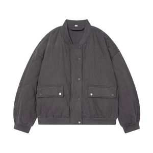 Women's dark grey quilted bomber jacket with wave stitching and snap button closure