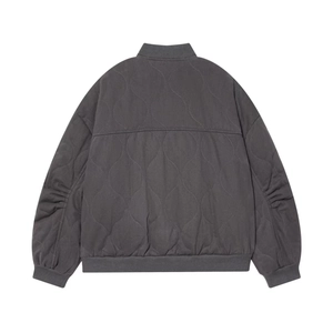 Dark charcoal grey quilted bomber jacket with wave stitching and ribbed collar