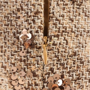 Brown tweed sequin dress fabric detail with matching invisible zipper closure