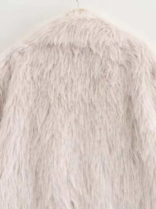 Detailed back view of a plush light purple faux fur coat with soft oversized texture