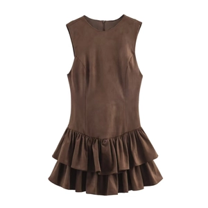 Detail of deep brown sleeveless suede dress featuring elegant double ruffles and slim fit