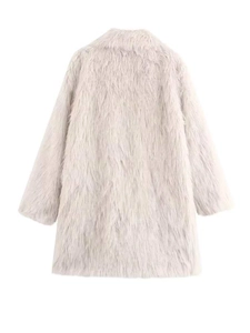 Detail view of the soft faux fur texture on the back of a light grey oversized winter coat
