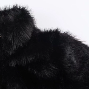 Chic black faux fur jacket with a high stand-up collar and luxurious soft dense texture
