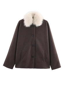 Detail of vintage brown wool coat with luxurious white faux fur collar and button closure