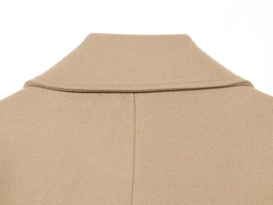 Detail of the high-quality stitching and collar structure of this khaki wool coat