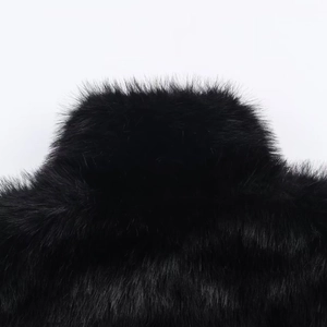 Close-up of thick black faux fur collar showing soft texture and high-density fibers