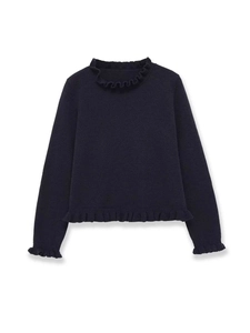 Detail view of navy knit sweater showing elegant ruffled edges on cuffs and hem