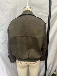 Back view of a dark brown faux suede bomber jacket with ribbed hem and stitched panels