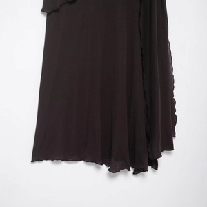 Dark brown asymmetrical layered skirt with ruffled hem made of textured knit fabric
