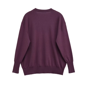 Close-up of the back view of a relaxed-fit V-neck knit sweater in deep purple plum color