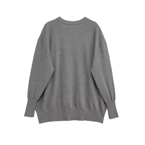 Detailed back view of a dark grey loose-fit V-neck knit sweater with ribbed cuffs
