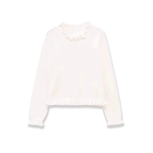 Minimalist white long-sleeve knit top with elegant ruffle trim and scalloped edges