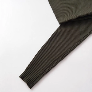 Slim fit olive green ribbed knit long sleeve sweater featuring asymmetric details