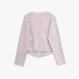 Lavender long sleeve knit cardigan with round neck and unique curved hem back view