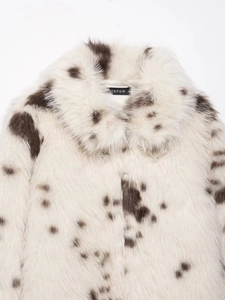Close-up of faux fur texture and lapel design on this spotted animal print jacket