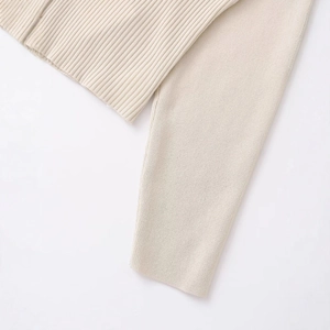 Chic beige rib-knit long sleeve sweater with detailed crewneck buttoned knitwear texture
