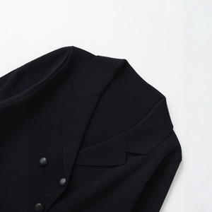 Women's black textured knit blazer jacket featuring notched lapels and matte buttons
