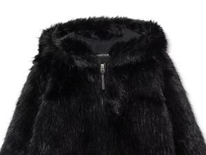 Detailed close-up of premium faux fur texture and branded inner label on black hooded jacket