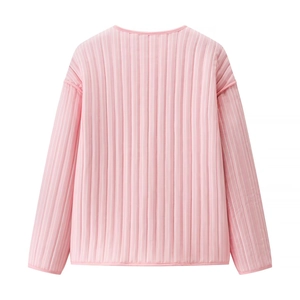 Close-up of pink long-sleeved top showing vertical white stripes and high-quality fabric