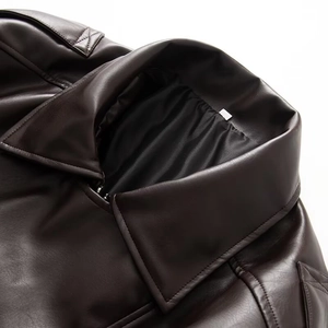Oversized brown leather biker jacket for women featuring lapel collar and metal zipper