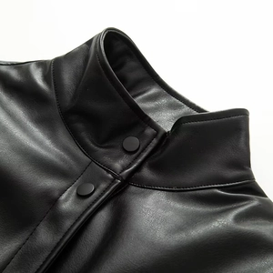 High-neck black faux leather bomber jacket with matte snap buttons and textured finish