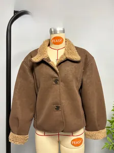 Detail of short faux shearling jacket in brown leather with khaki fleece trim and buttons