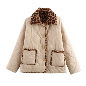 Women's reversible quilted jacket in beige featuring leopard faux fur collar and trim