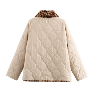 Back view of beige quilted jacket featuring leopard faux fur collar and hem details