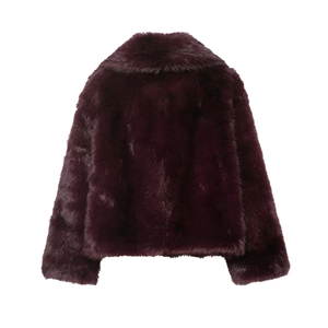 Macro detail of high-shine faux fur texture and lapel collar on burgundy short coat