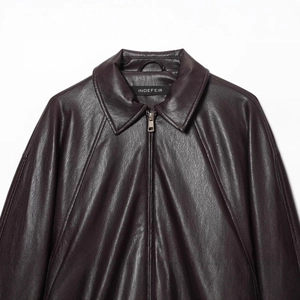 Classic dark brown faux leather bomber jacket with silver zipper and pebbled texture
