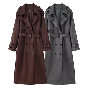 Detail of double-breasted long coats in dark brown and charcoal grey with waist belts