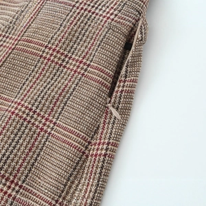 Houndstooth high-waisted shorts featuring a concealed zipper and vintage fabric details