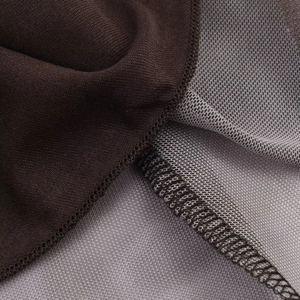 Detail view of plaid mesh dress showing professional overlock stitching and breathable fabric