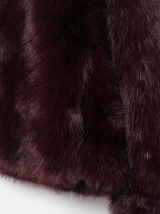 Detailed close-up of soft burgundy faux fur texture with high gloss and plush finish