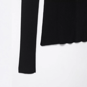 Gilet noir pour femme en maille côtelée avec manches longues et finitions soignées