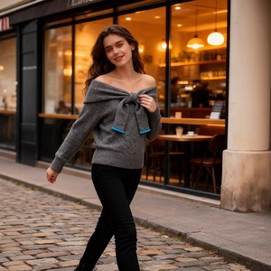 Chic off-the-shoulder grey knit sweater featuring a stylish oversized front bow detail
